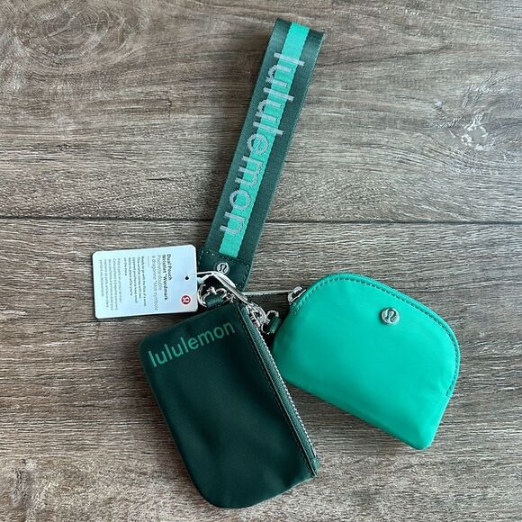 Lululemon Dual Pouch Wristlet Wordmark Legacy Green/Cascadia Green/White NWT - Picture 1 of 5